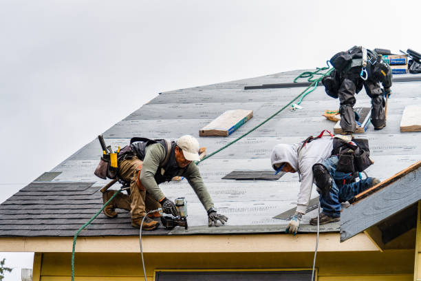 Professional Roofing technician working in Center, TX